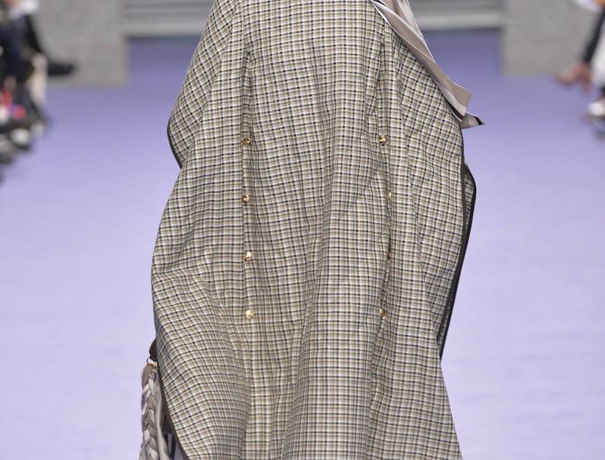coat clothing apparel sleeve person human fashion runway long sleeve