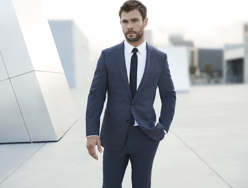 clothing apparel suit overcoat coat person human tie accessories man