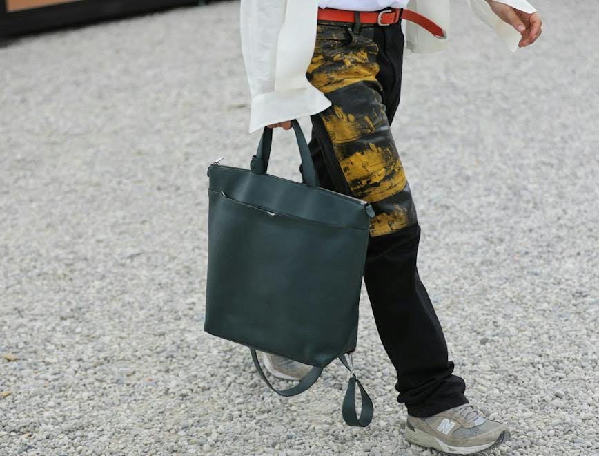 shoe footwear clothing apparel person human handbag bag accessories accessory
