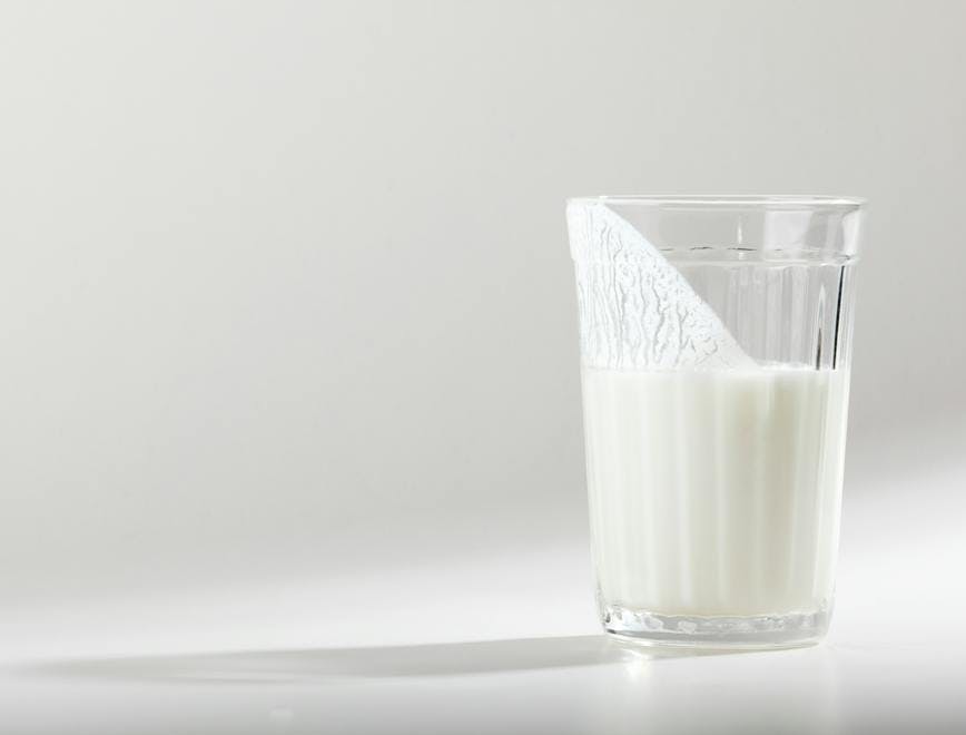 focus on shadow,white background,healthy eating,meal,drinking gl milk beverage drink