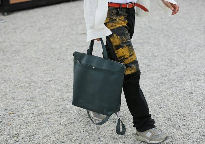 shoe footwear clothing apparel person human handbag bag accessories accessory