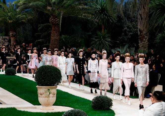 chanel collection couture fashion show nowfashion pfw paris fashion week runway spring summer 2019 person human clothing apparel plant grass