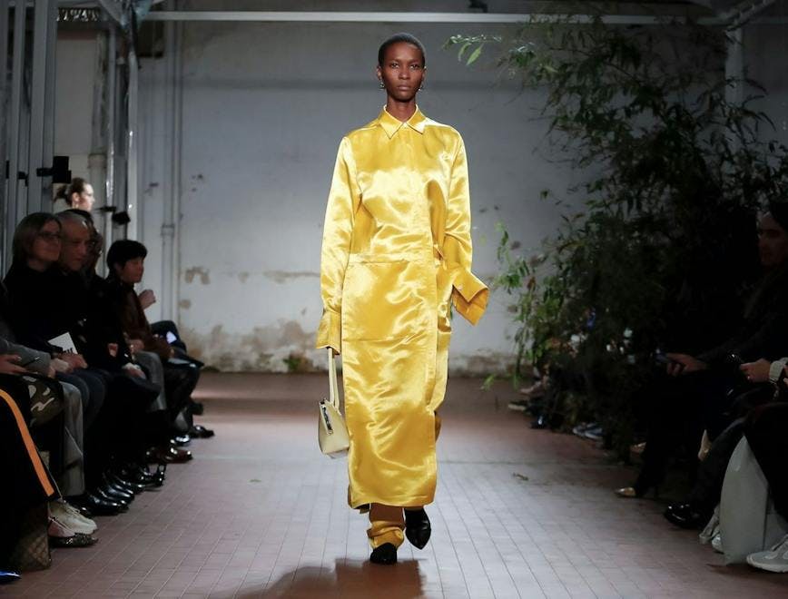 clothing apparel person human coat raincoat