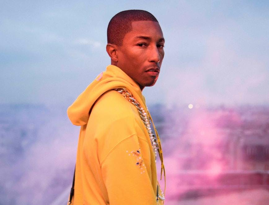 a still from the chanel-pharrell capsule collection film clothing apparel person human coat