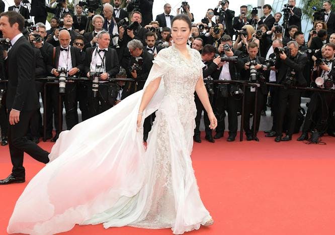 cannes paparazzi person human wedding gown wedding gown robe fashion clothing apparel