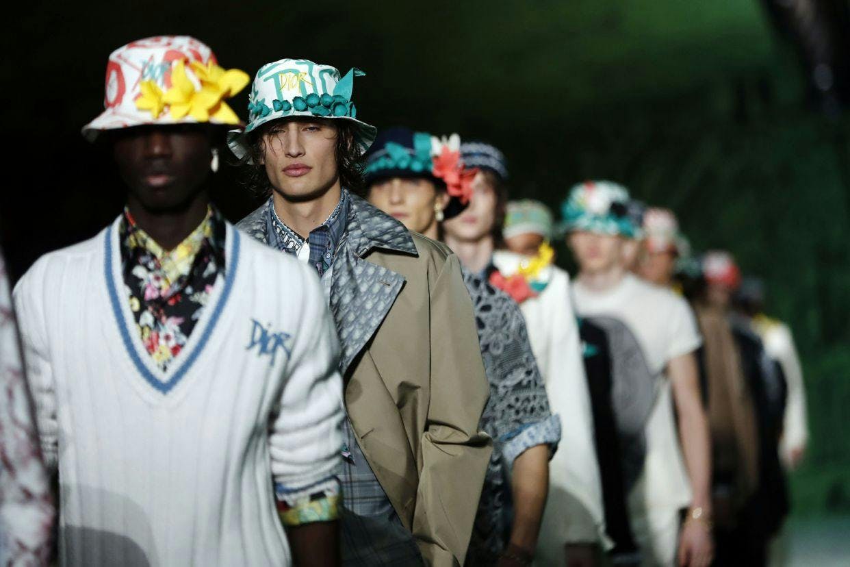 person human hat clothing apparel crowd helmet