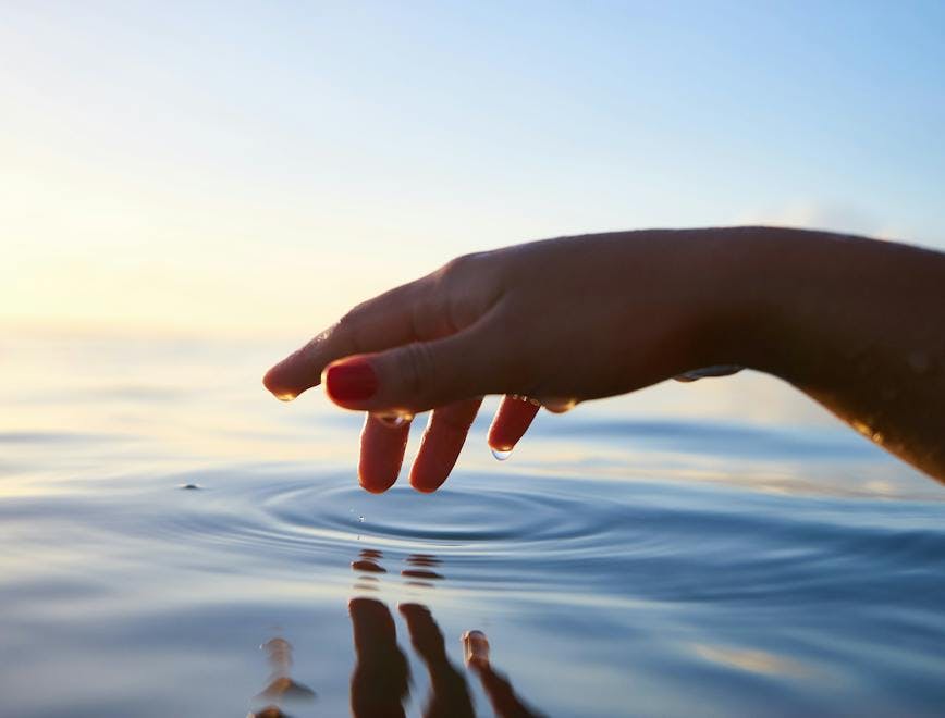 outdoors water person human finger hand