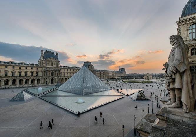louvre downtown city urban building town architecture person human triangle