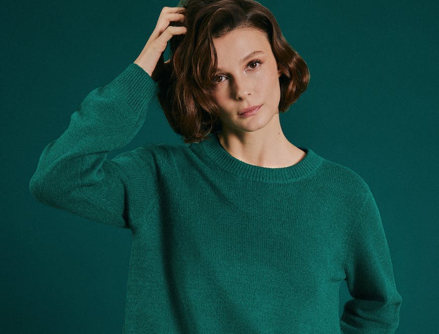 clothing knitwear sweater long sleeve adult female person woman sweatshirt face