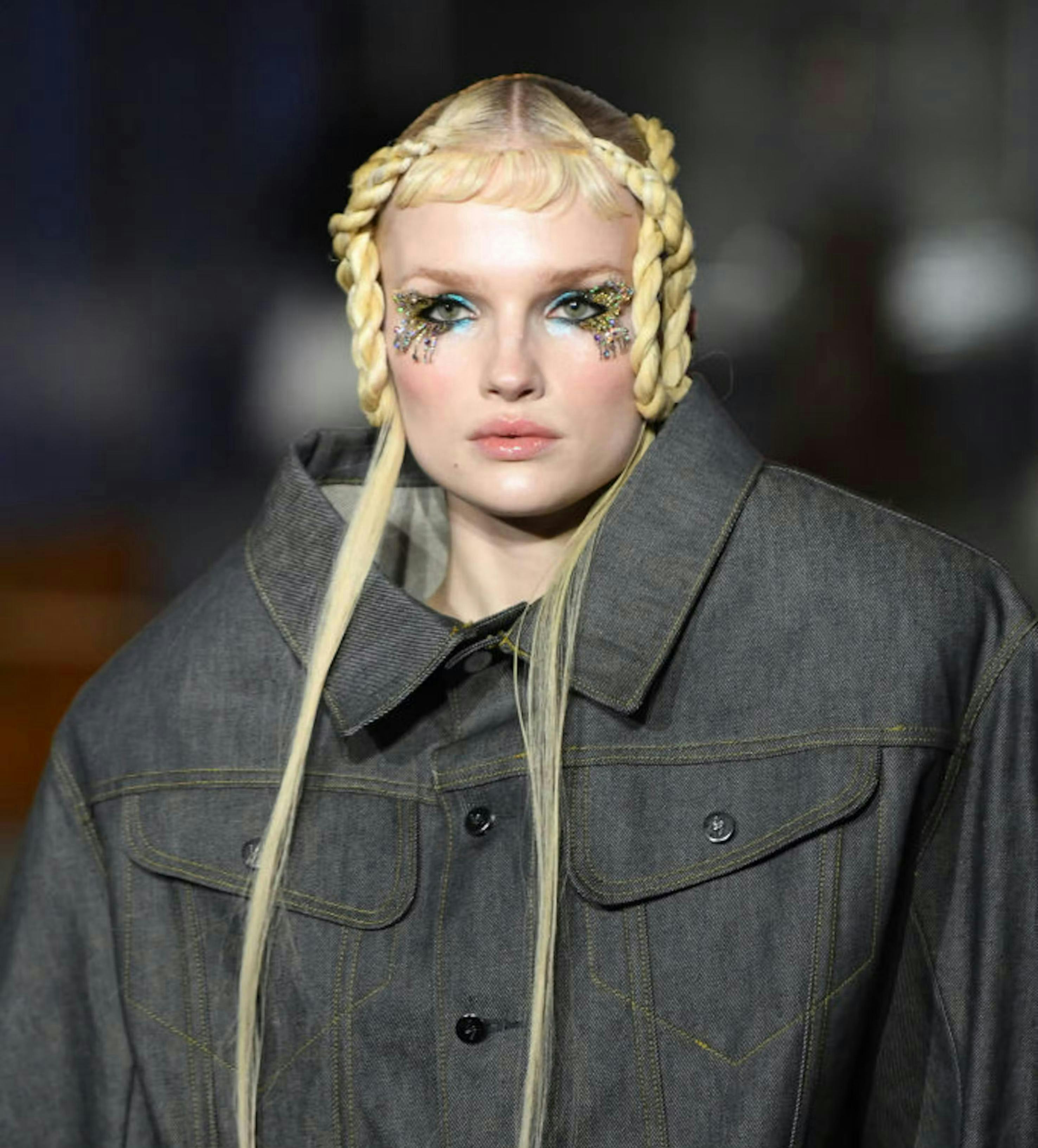 blonde hair person braid clothing coat jacket face head