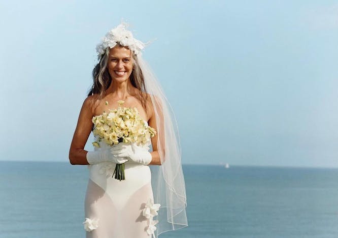 dress formal wear wedding gown beachwear adult bride female person woman glove