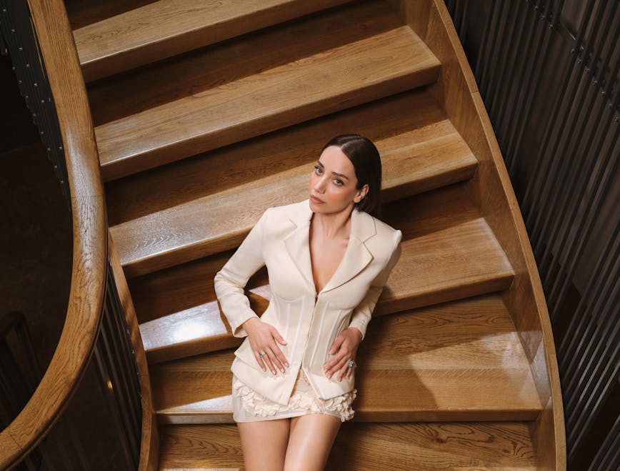 wood hardwood housing staircase adult female person woman blazer smile